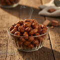Smoked Maple Peanuts in a glass bowl